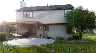 Asbury Neighborhood Polymeric Siding Installation in Mason City, Iowa — Roofing & Gutter Services project by Midwest Construction & Supply INC