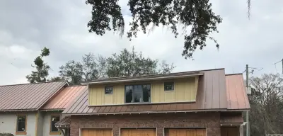 Jacksonville, FL Private Residence - Copper Roofing — Roofing & Gutter Services project by Huber & Associates