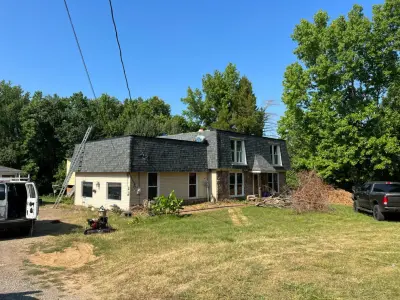 Shingle and TPO Roof Replacement — Roofing & Gutter Services project by Roof MD