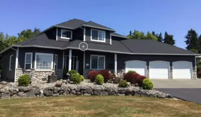 Snohomish Gorgeous Residence - Roof Replacement and New Gutters — Roofing & Gutter Services project by Eastside Roofing Inc