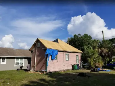Tampa, FL Roofing Services — Roofing & Gutter Services project by Momentum Roofing Inc.