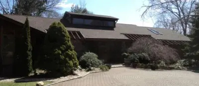 Zoe Renovation, Inc. - Roofing & Gutter Services in Huntington, NY