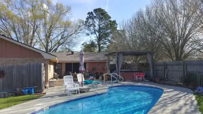 Outdoor Paradise - Shingle Roofing — Roofing & Gutter Services project by Roofing Louisiana