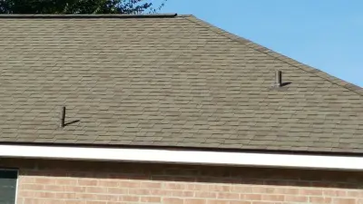Brick House - Shingle Roof — Roofing & Gutter Services project by Roofing Louisiana