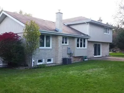 Elastomeric Roofing — Roofing & Gutter Services project by New Edge Improvement