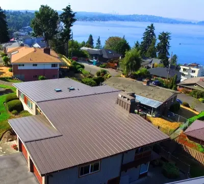 Metal Roofing in Seattle — Roofing & Gutter Services project by Three Tree Roofing