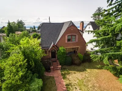 Seattle Tudor Residence Roof Renovation — Roofing & Gutter Services project by Valentine Roofing