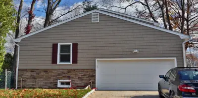 Cladding and Versetta Stone — Roofing & Gutter Services project by Hendo Contracting