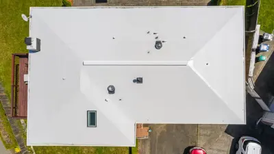 Contemporary PVC Flat Roof in Burien, WA — Roofing & Gutter Services project by Valentine Roofing