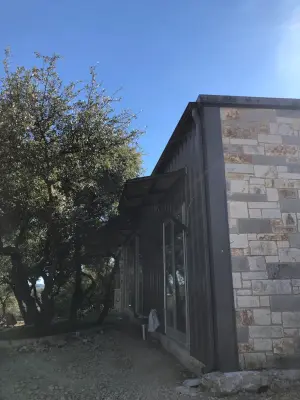 Flat Roof Gutter Installation in K-Style at Spicewood — Roofing & Gutter Services project by Gutter Tex