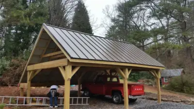 Seamless Garage Roof System — Roofing & Gutter Services project by Roof Authority