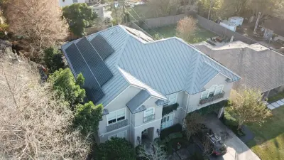Metal Roof with Standing Seam in Bellaire Texas — Roofing & Gutter Services project by Houston Metal Roofing Services