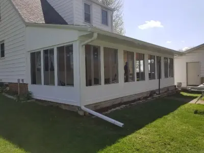 Des Moines, Iowa Sunroom Installation — Roofing & Gutter Services project by Midwest Construction & Supply INC