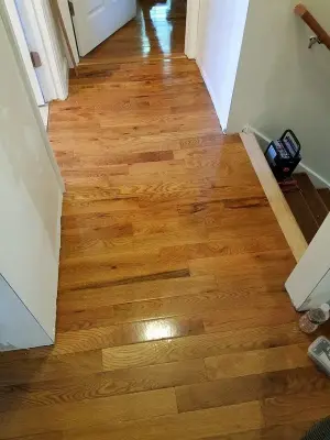 Swanzey Interior Flooring — Roofing & Gutter Services project by Giroux Home Improvement LLC