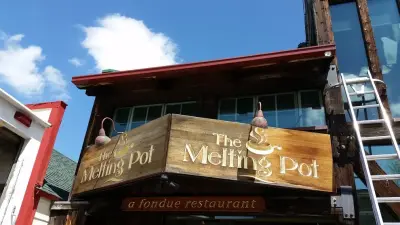 The Seamless Box Gutter Installation by The Melting Pot — Roofing & Gutter Services project by Precision Seamless Gutters LLC