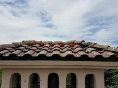 Roof Tile Restoration — Roofing & Gutter Services project by American Roofing And Restorations