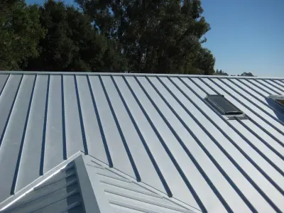 Galvalume Vertical Panel Roofing System — Roofing & Gutter Services project by Fidelity Roof Company