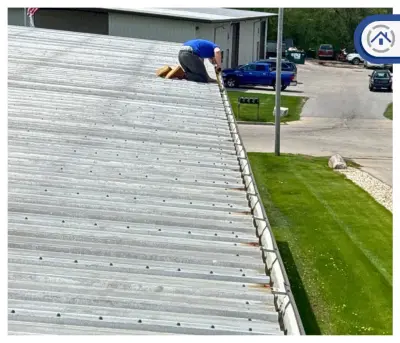 Gutter and Downspout Cleaning and Repair in Waukesha, WI — Roofing & Gutter Services project by Modern Exterior Roofing