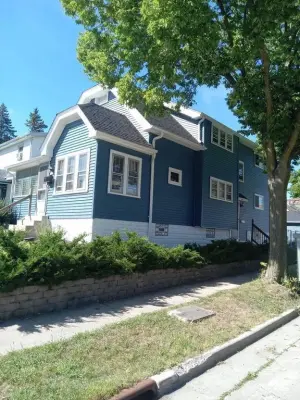 West Allis Siding Upgrade — Roofing & Gutter Services project by Modern Exterior Roofing