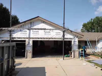 Siding Replacement in West Bend — Roofing & Gutter Services project by Modern Exterior Roofing
