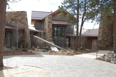 Western Rust Vertical Seam Metal Roofing — Roofing & Gutter Services project by Coated Metals Group
