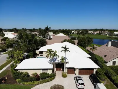 Boca Raton White Tile Roofing — Roofing & Gutter Services project by Evans Roofing