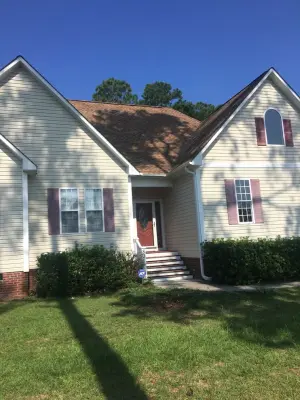Golden Cladding Artisan — Roofing & Gutter Services project by Patriot Roofing Company