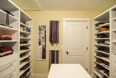 Ben and Jennie's Personalized Master Walk-In Closet — Design-Build Services project by Labra Design Build