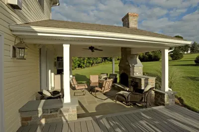 Alfresco Living Areas: Sheltered Porch Featuring Stone Hearth and Fireplace — Design-Build Services project by Penn Contractors Inc