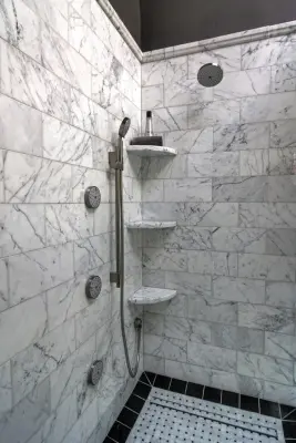 Des Peres, MO Marble Luxury Bathroom — Design-Build Services project by Mosby Building Arts