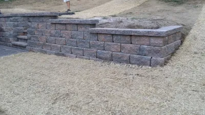 New wall and steps — Landscape Construction project by McCabe's Lawn Care
