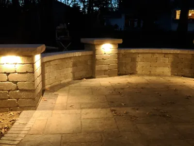 Valparaiso Backyard Patio with Landscape Lighting — Landscape Construction project by NWI Patio Pros in Valparaiso