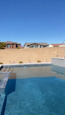 Landscape improvement on a backyard, a huge difference! Bigger better plants, wi — Landscape Construction project by Mojave Land Maintenance in Las Vegas