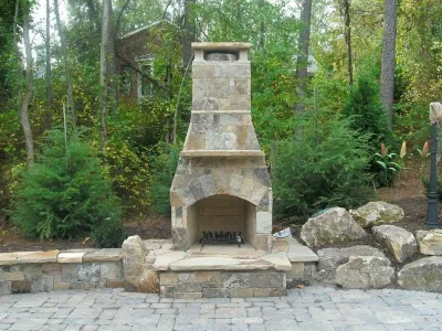 Firepits & Outdoor Fireplaces — Landscape Construction project by Property Masters Landscape And Design
