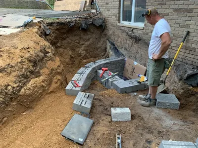 Retaining wall in Inver Grove Heights, MN — Landscape Construction project by South Metro Lawn And Landscape