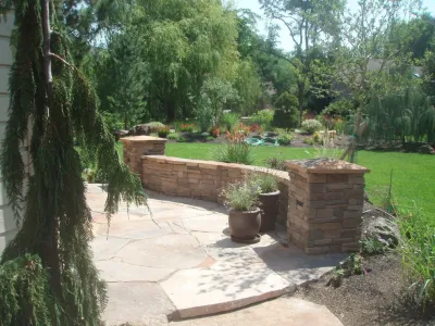 Stone Patio Backyard Renovation — Landscape Construction project by TLC Landscape