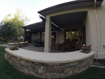 Cedar Pergola with Stone Seating — Landscape Construction project by TLC Landscape