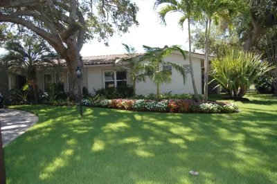 Siesta Key canal front by Design Scapes