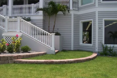 Lido Key Coastal style landscape with lagoon pool — Landscape Design project by Design Scapes in Sarasota