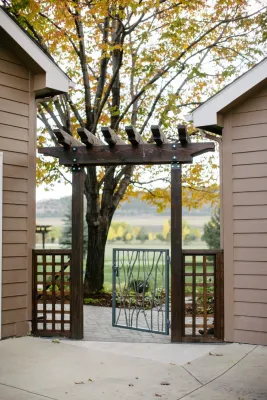 Patio with Fire Pit and Arbor Pathways by Detailed Landscape