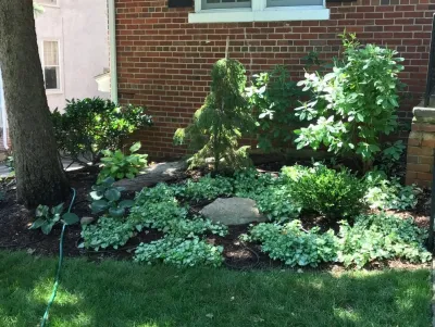 Shady foundation planting by Earth Essence Designs