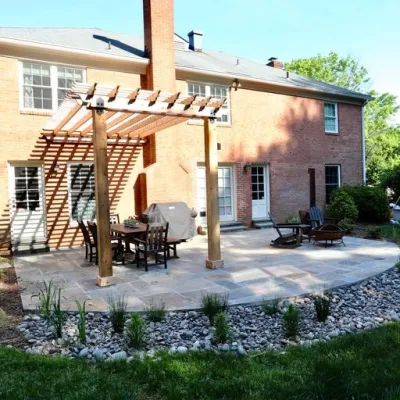 Patio, pergola, and drainage by Earth Essence Designs