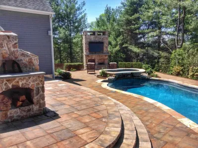 Mendham, New Jersey Backyard Retreat with Pizza Oven. by Earth, Turf & Blooms