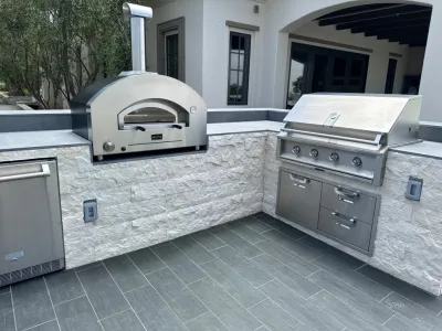 Pizza Oven , BBQ, Porcelain patios — Landscape Design project by Exterior Designs Landscape