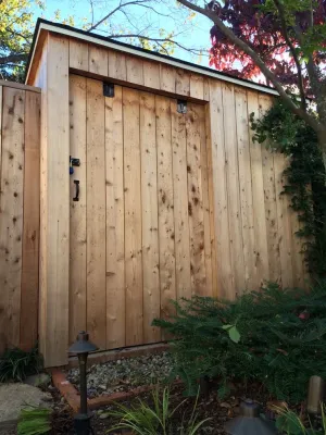 Georgetown home gains optimal outdoor storage and screening by Tiger Lily Landscapes, LLC