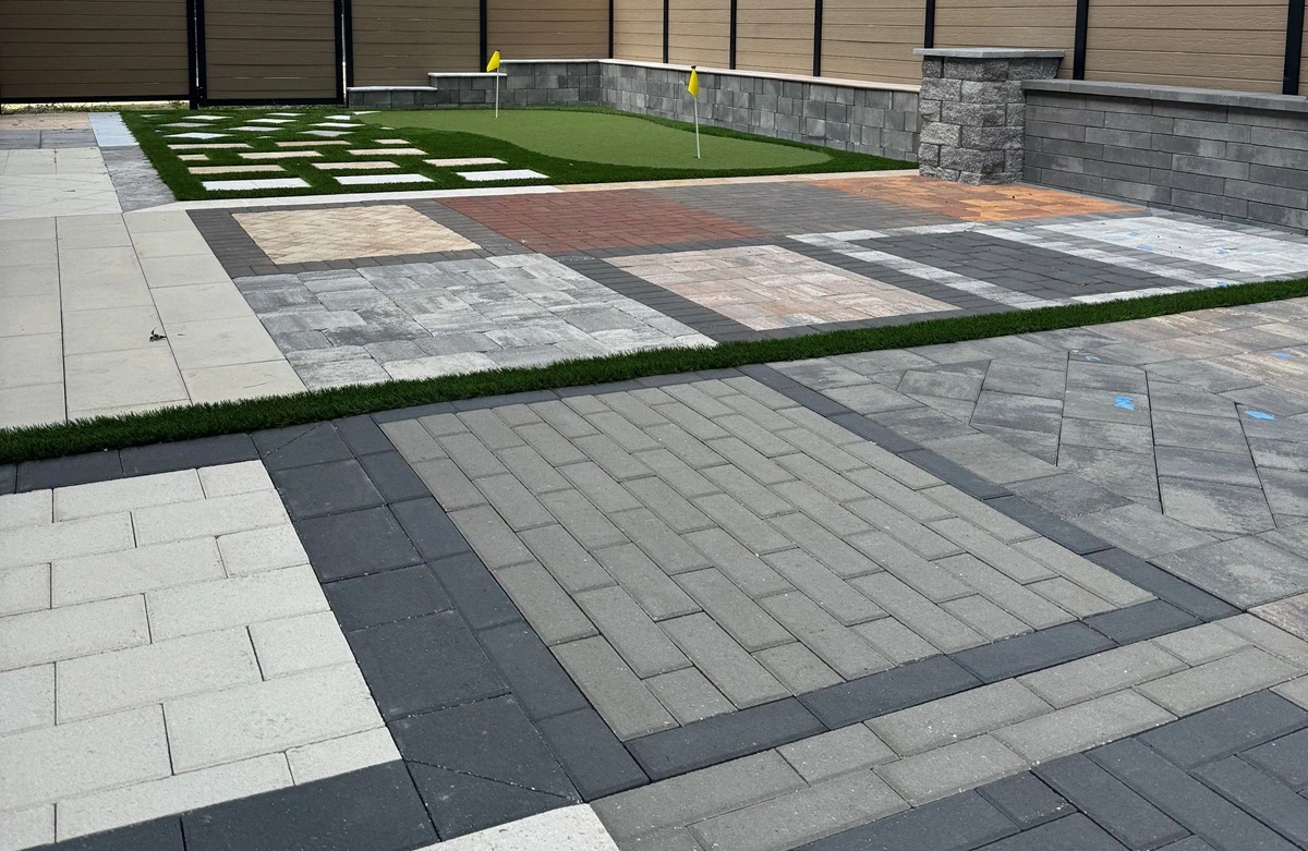 Choosing the Right Patio Material: Concrete, Stone, or Pavers?