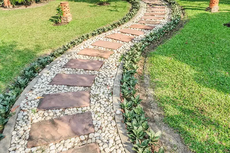 How to Design a Walkway That Complements Your Landscape
